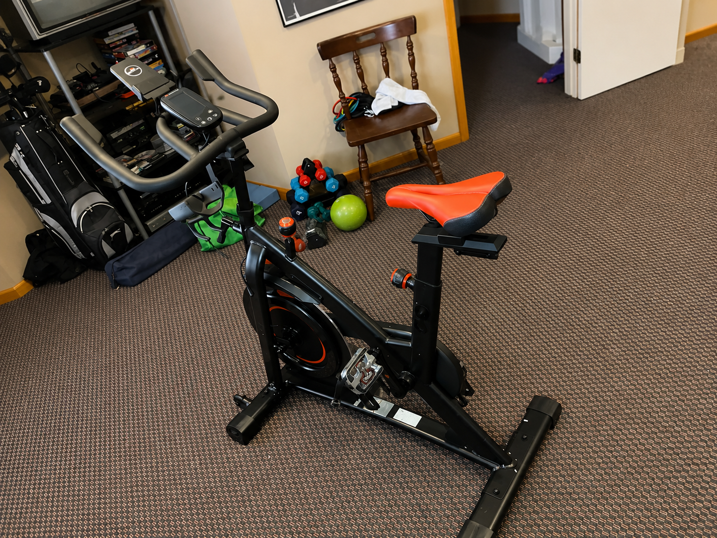 Exercise bike assembled in a home workout space.